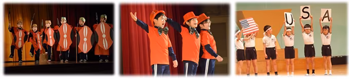 壇上で劇を行っている学生たちの写真